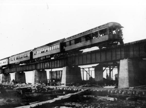 1912 historical photograph of Henry Flagler's 'Rambler' train on a Florida railroad bridge, from the Florida Photographic Collection.
